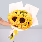 Bouquet of sunflowers and yellow roses