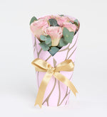 7 pink roses in a pink decorative box
