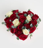 Red rose and white rose in heart box