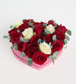 Red rose and white rose in heart box