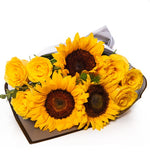 Ramo de girasoles y rosas amarillas