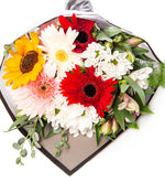 Ramo de margaritas blancas y gerberas rosas