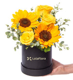 Rosas amarillas y girasoles en caja elegante