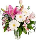 Astromelias, lirios y gerberas blancas en jarrón