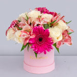 Pink Rose, Pink Alstroemeria, and pink gerberas in a pink box