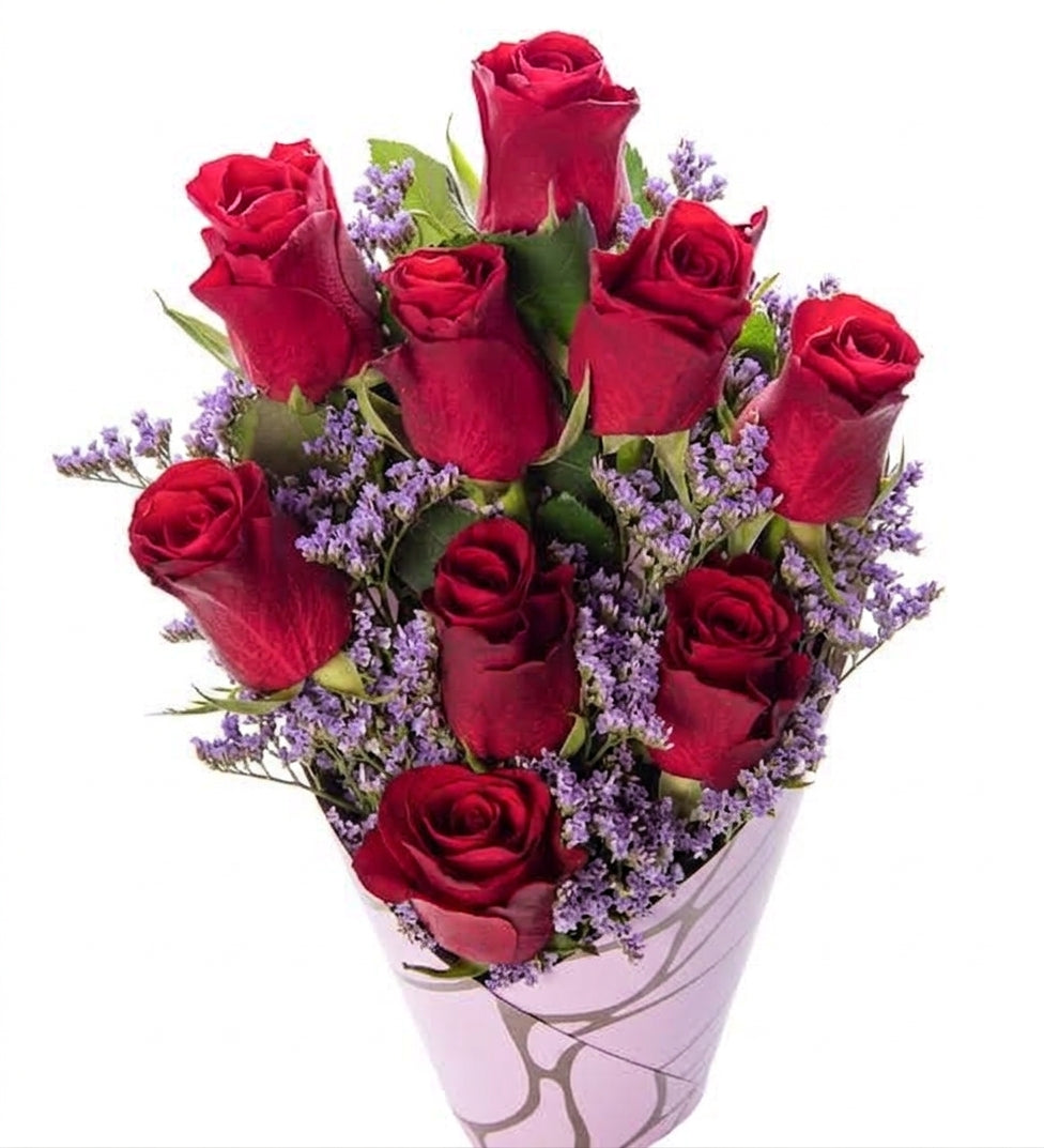 9 red roses in a pink decorative box