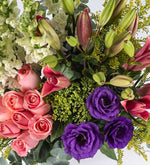 Pink Roses, Lily, and Purple Accents Arrangement