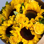 Bouquet of sunflowers and yellow daisies