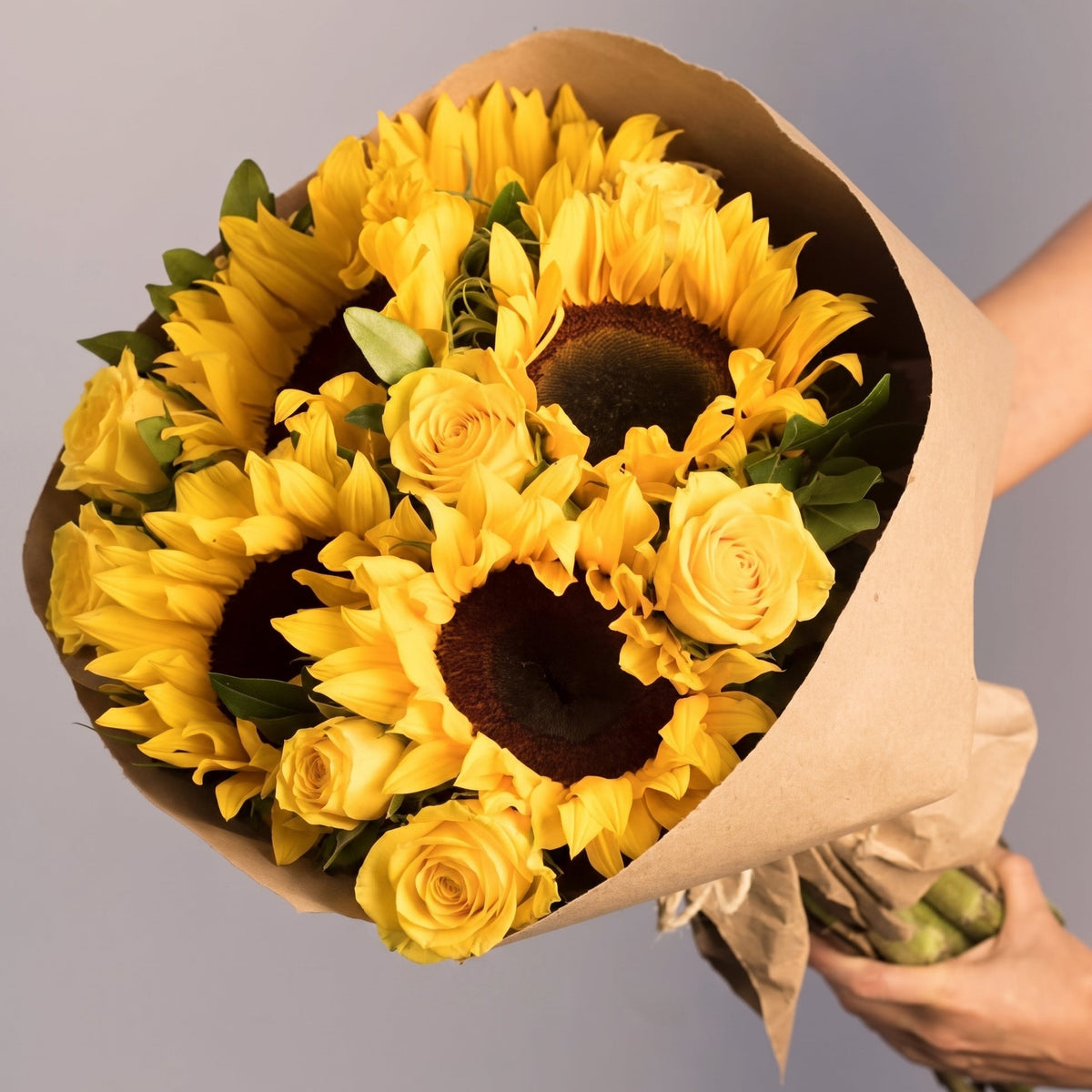Bouquet of sunflowers and yellow daisies