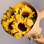 Bouquet of sunflowers and yellow daisies