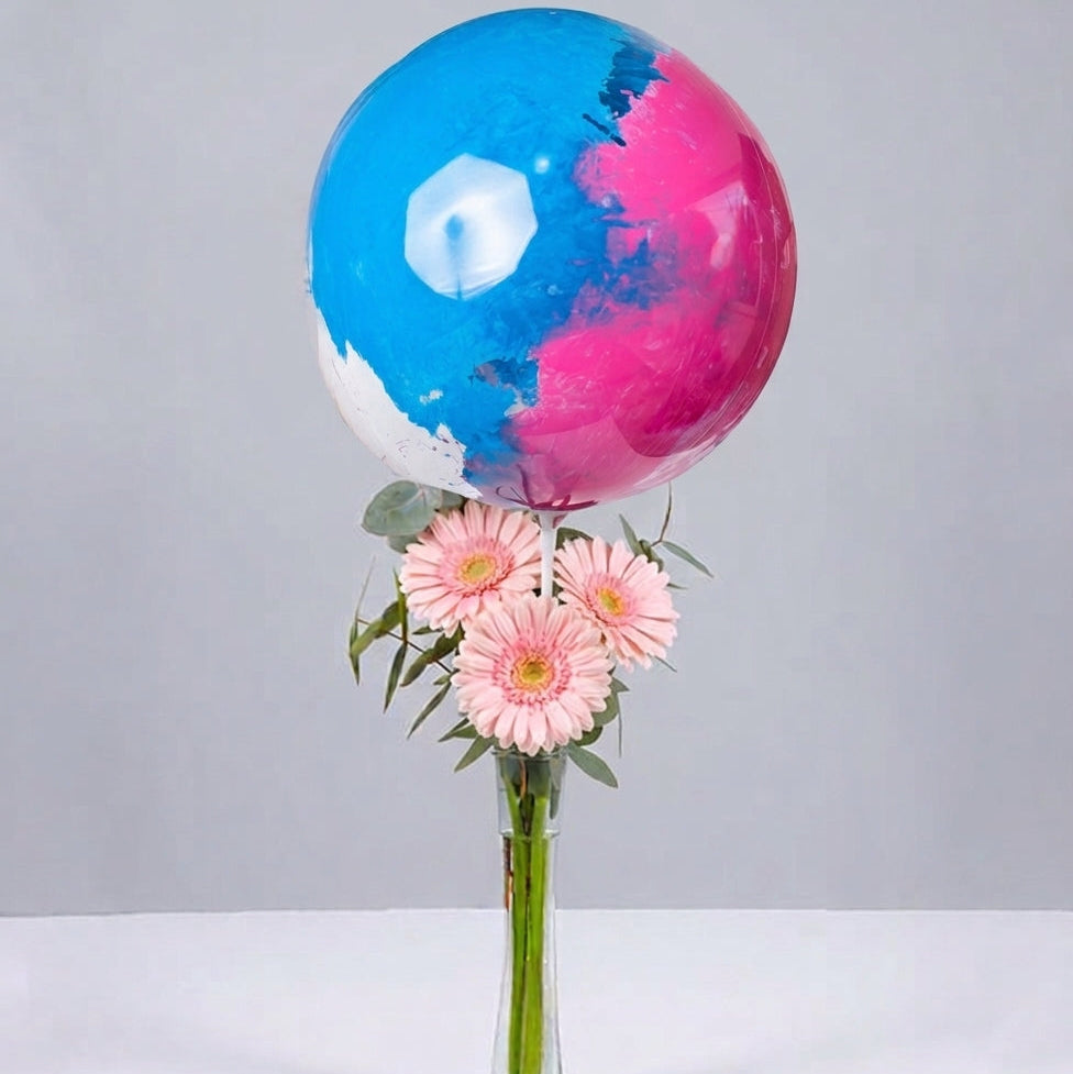 Autumn gerberas in a delicate vase and birthday balloon