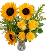 Sunflowers and yellow roses in a vase