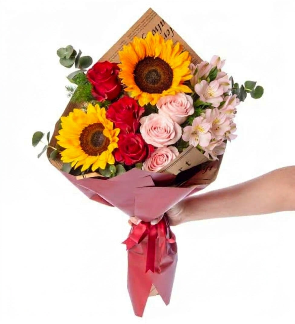 Sunflower and lilac rose and red rose in burgundy bouquet