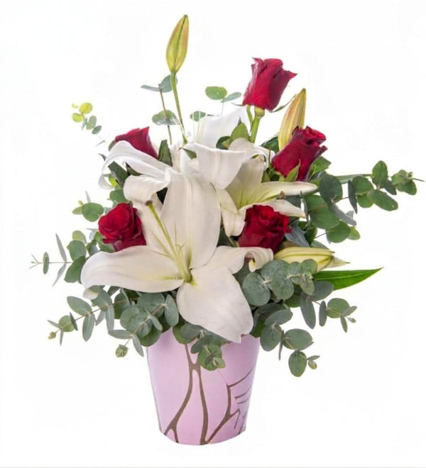 Red rose and white lily in pink decorative box