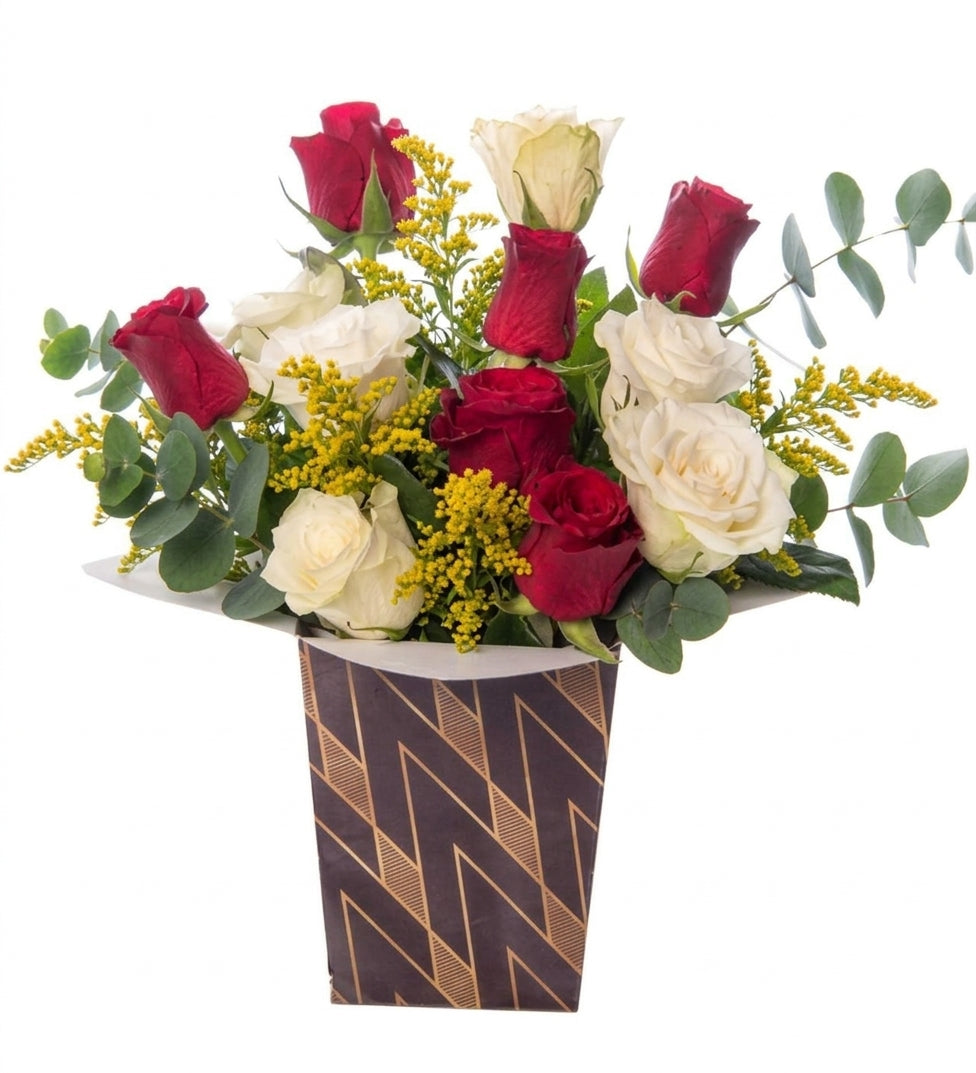 Red roses and white roses in a harlequin box