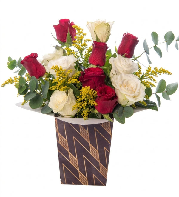 Red roses and white roses in a harlequin box