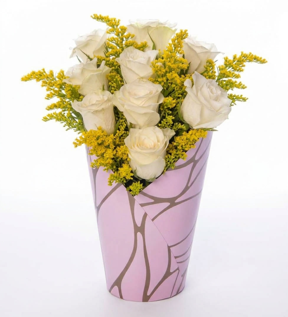 9 white roses in a decorative pink box
